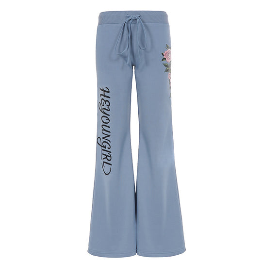 Damen nan ausgestellte Jersey-Sweathose mit Kordelzug, floralem Seitenprint und Statement-Schriftzug EB