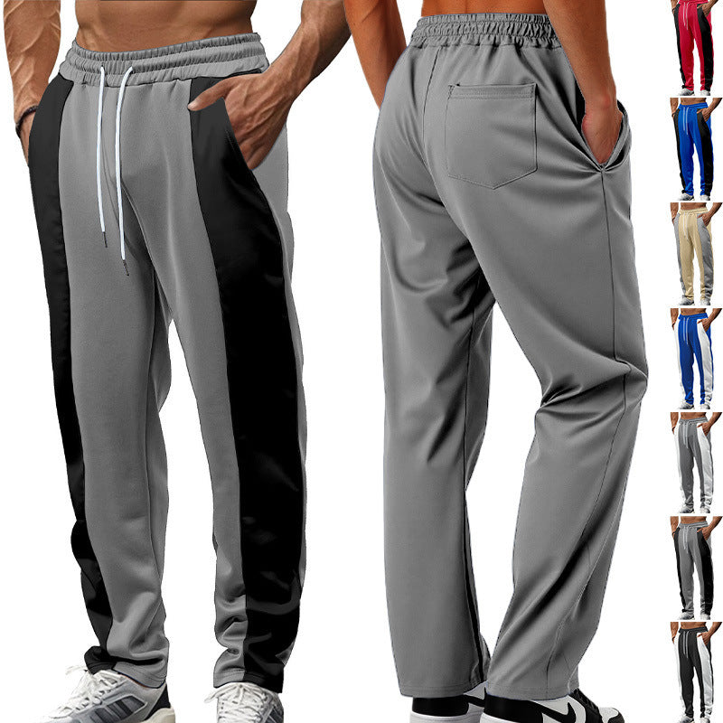 Herren nan sportive Trackpants mit seitlichen Kontrastbahnen elastischem Bund Kordelzug und Hirschstickerei EB