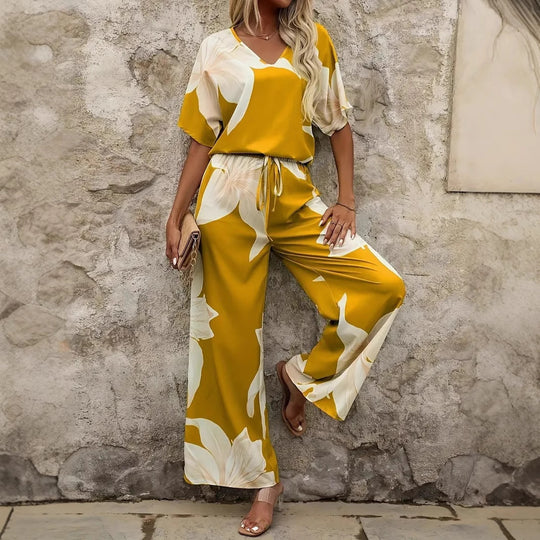 Damen Eleganter Jumpsuit mit floralen Mustern und weitem Bein EB