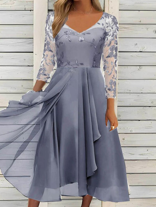 Damen Abendkleid mit floralen Spitzenärmeln und asymmetrischem Schnitt Heidi-Mode