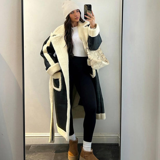 Damen Oversized Kunstfelljacke mit Taschen und elegantem Schnitt EB