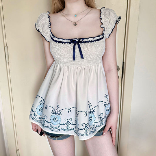 Damen Baumwollbluse mit floralem Stickdesign und schickem Rüschensaum EB