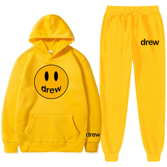 Unisex nan zweiteiliges Lounge-Set aus French-Terry mit Smiley-Print Kapuzenpullover und tapered Jogginghose EB