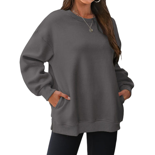 Damen nan verlängertes Oversize Rundhalspullover mit seitlichen Eingrifftaschen, Rippbündchen und überschnittener Schulter EB