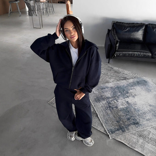 Damen lässiges Zip-Lounge-Set mit übergroßer Kapuzenjacke und taillierter Relax-Jogginghose Eichborn Berlin