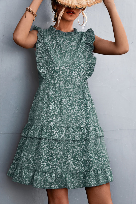 Damen luftiges Sommerkleid mit voluminösen Rüschensäumen und femininer Silhouette EB