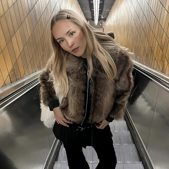 Damen Kunstpelzjacke mit voluminösen Ärmeln EB