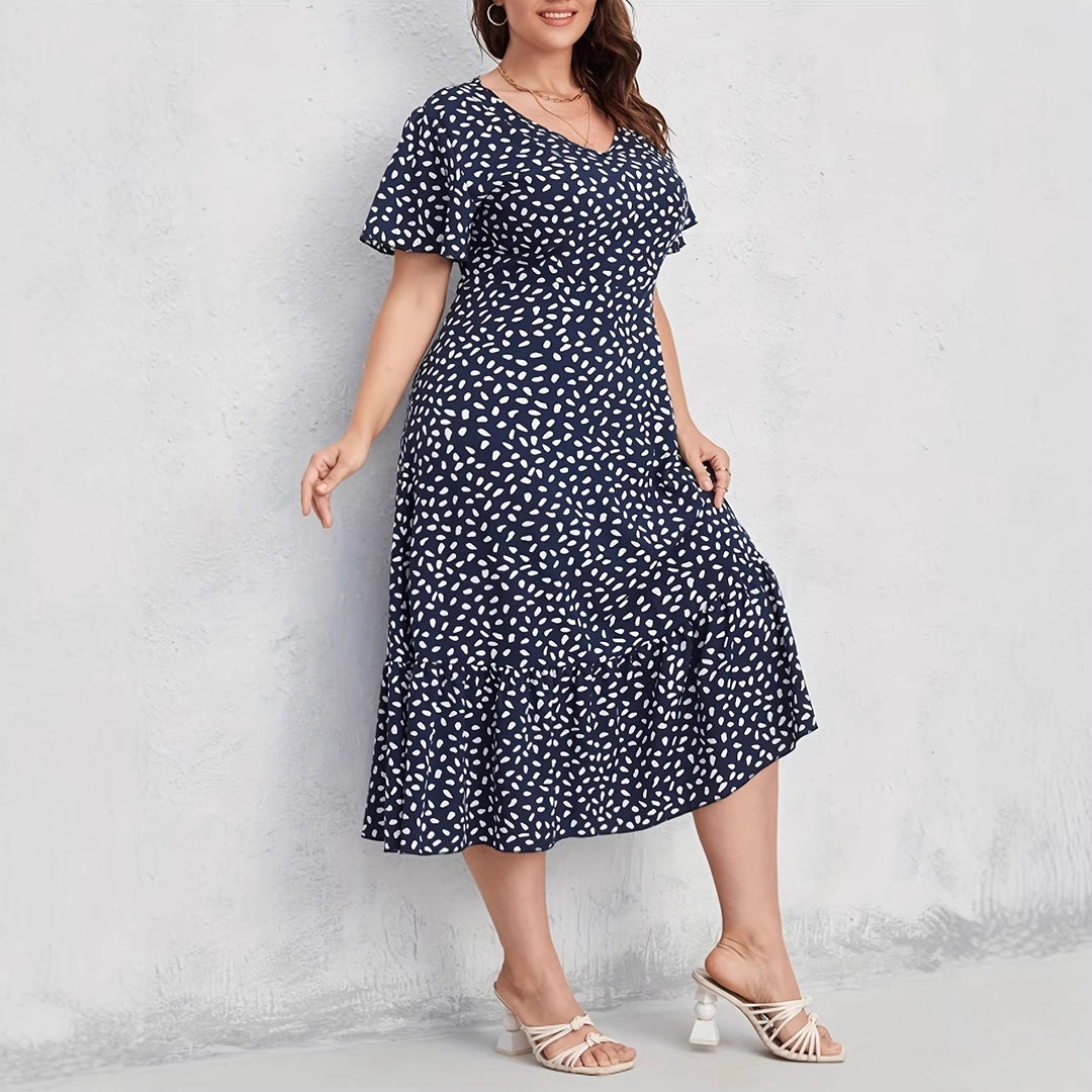 Damen Midi-Kleid mit fließendem Schnitt und verspieltem Muster EB