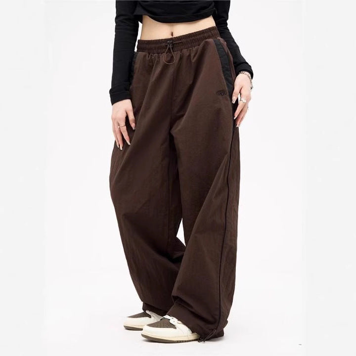 Damen nan weite Trackhose mit Kontrastpaspel, elastischem Bund und Oversize-Schnitt EB