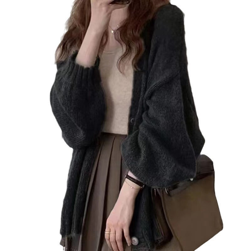 Damen Modische Strickjacke mit weiten Ärmeln und eleganten Details EB