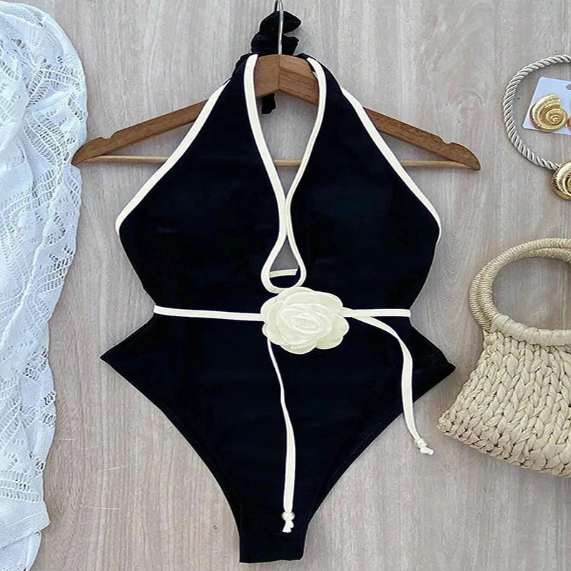 Damen eleganter einteiliger Badeanzug mit raffinierten Cut-Outs und floralem Gürtel EB