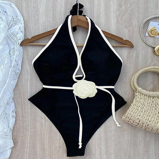 Damen eleganter einteiliger Badeanzug mit raffinierten Cut-Outs und floralem Gürtel EB