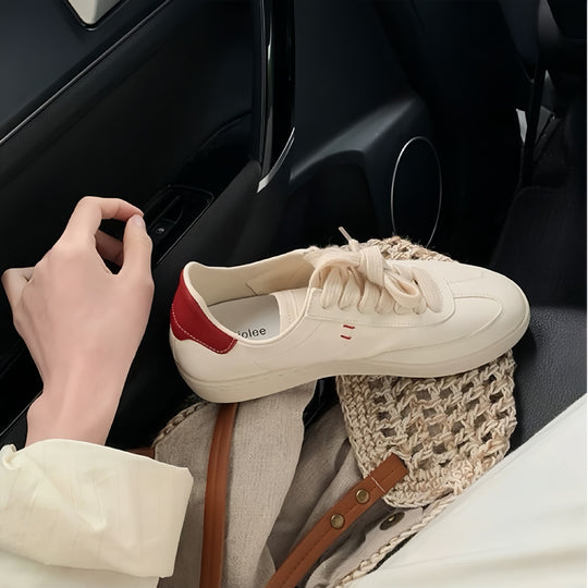 Damen Sportliche Sneaker mit minimalistischer Silhouette und atmungsaktiver Oberflächenstruktur EB