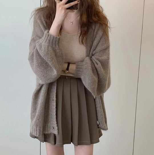Damen Modische Strickjacke mit weiten Ärmeln und eleganten Details EB