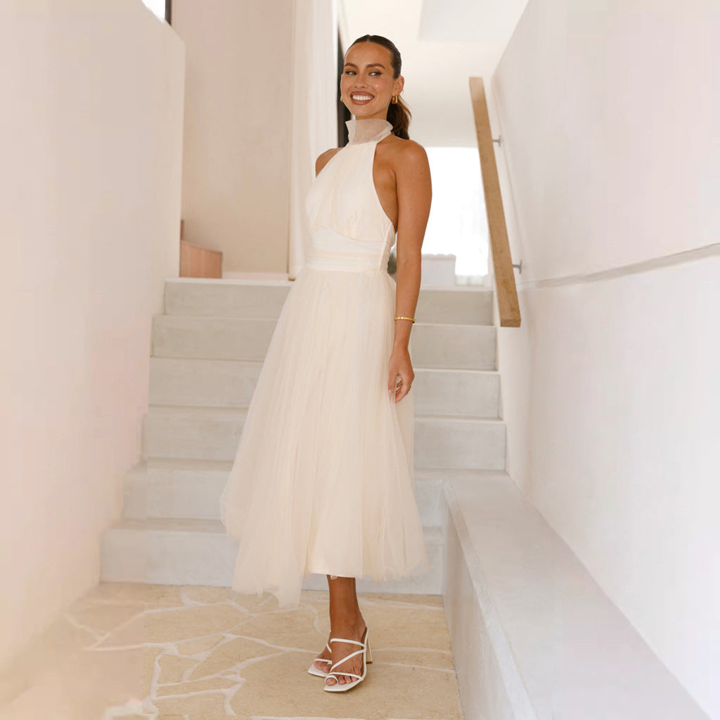 Damen Tüllkleid mit elegantem Halterneck und schwingendem Rock EB