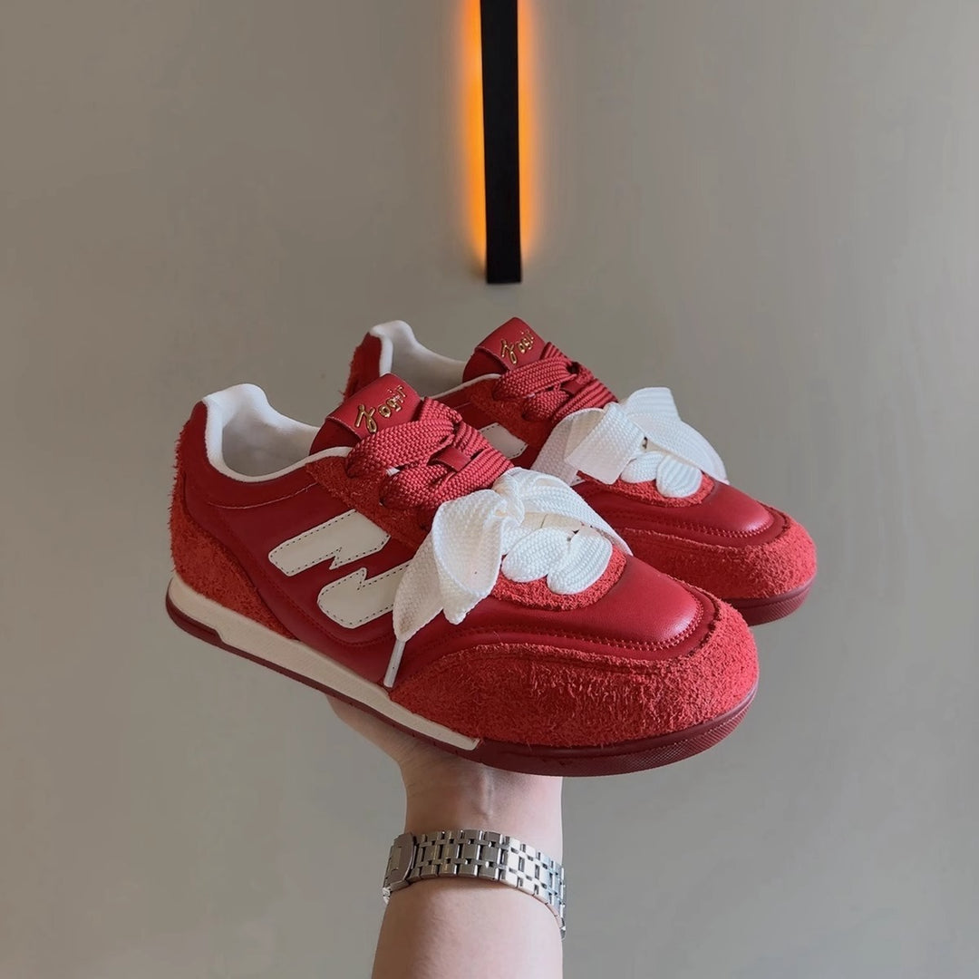 Damen Sneaker mit auffälligem Band und sportlichem Design EB