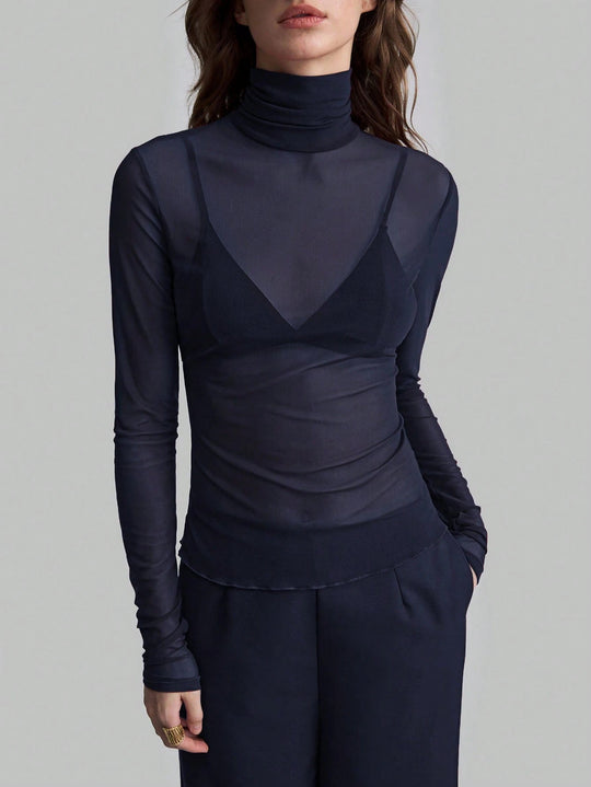 Damen Transparente Turtleneck-Bluse mit figurformendem Schnitt EB