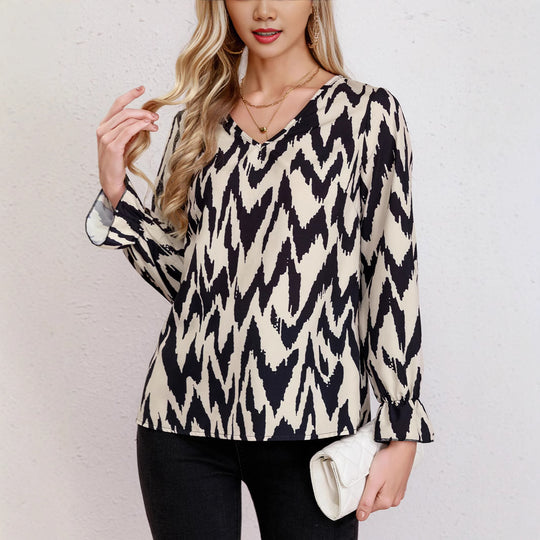 Damen Bluse mit modernem Zickzackmuster und eleganten Ballonärmeln EB