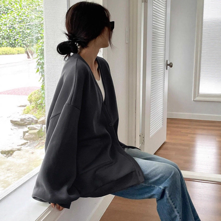 Damen Oversized Sweatcardigan mit Knopfleiste, aufgesetzten Taschen und überschnittener Schulter EB