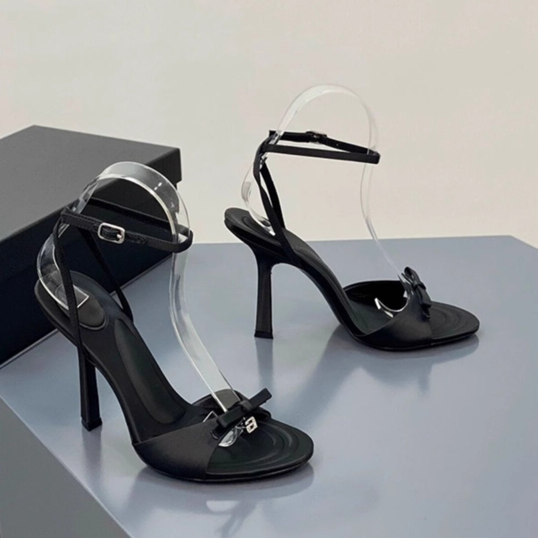Damen elegante High Heel Sandalen mit transparentem Riemen und stilvollen Schleifen EB