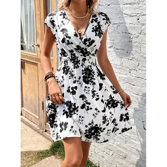 Damen Wickelkleid mit floralem Muster und elastischer Taille EB