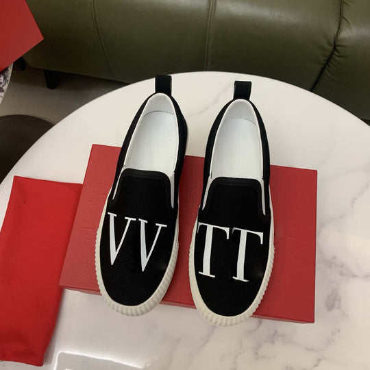 Damen Slip-On Sneakers mit modischem Logo-Design EB
