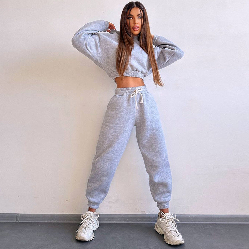 Damen cropped Stehkragen-Sweatset mit elastischem Taillenbund und hochtaillierter Tapered-Jogginghose Eichborn Berlin