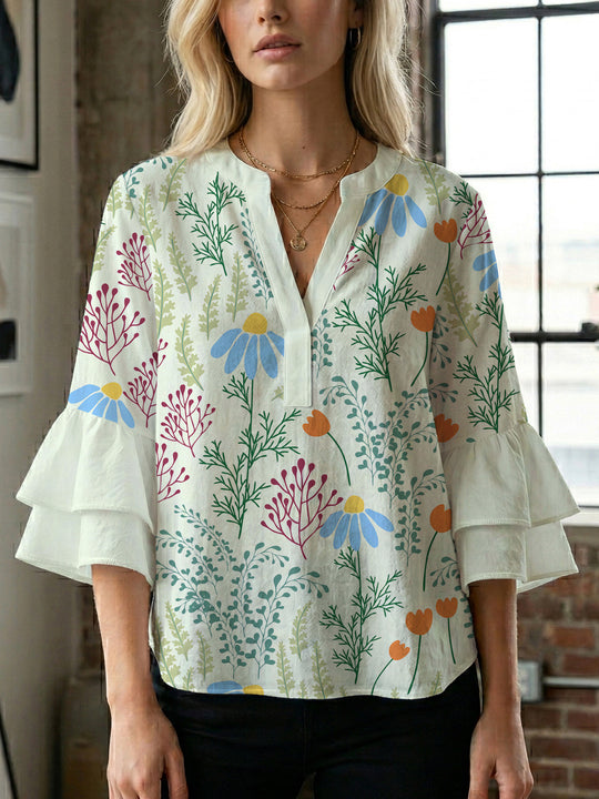 Damen Blusenshirt mit voluminösen Ärmeln und floralem Muster EB