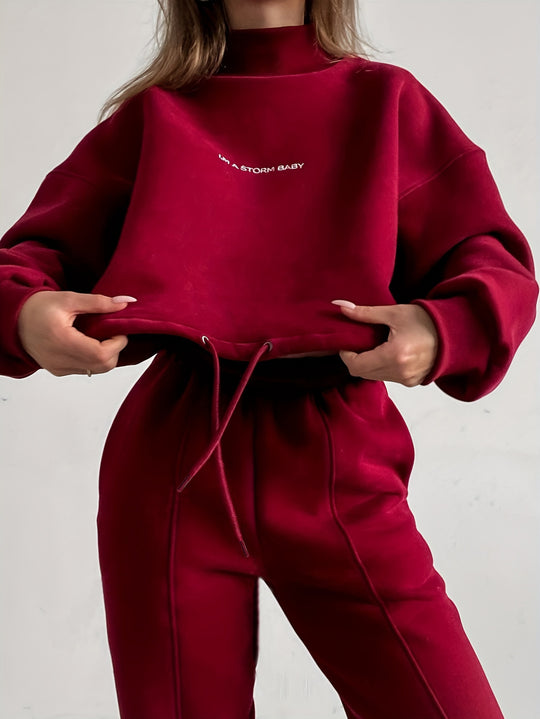 Damen Sportliches Set mit hochgeschlossenem Sweatshirt und elastischen Hosen EB