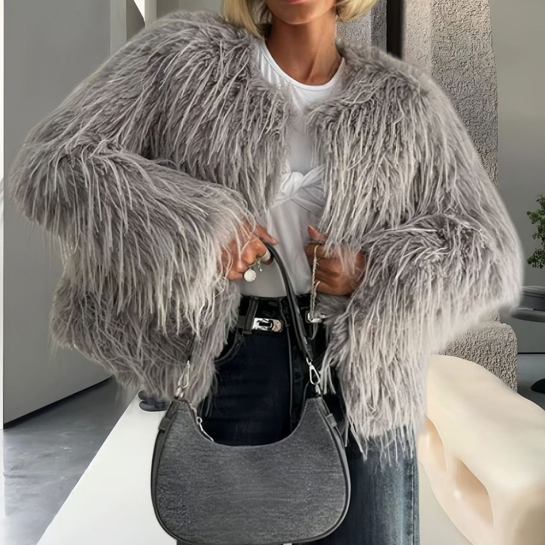 Damen Modische Kunstpelzjacke mit voluminösen Ärmeln EB