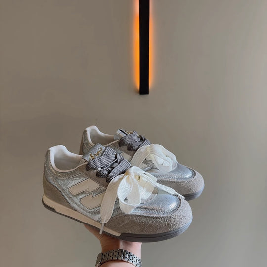 Damen Sneaker mit auffälligem Band und sportlichem Design EB