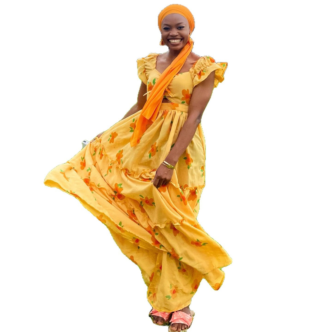 Damen Maxikleid mit voluminösen Rüschen und floralen Akzenten EB