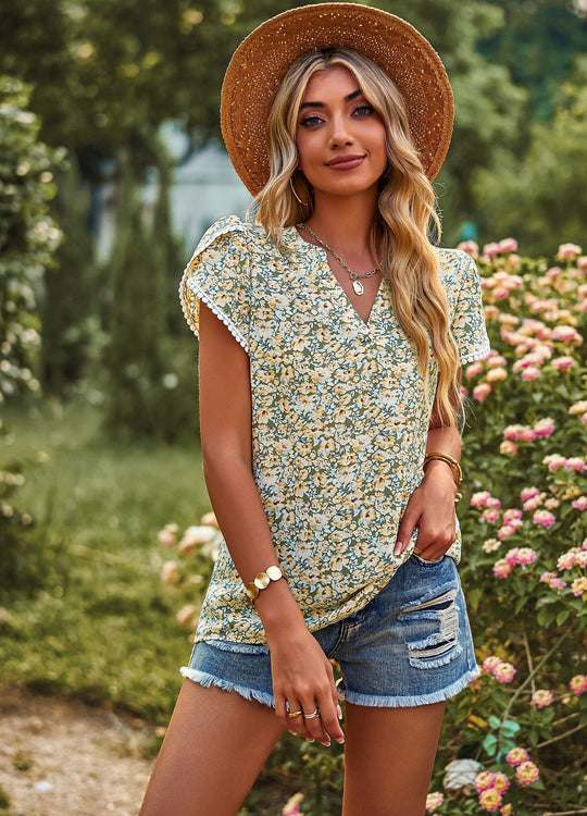 Damen Luftiges Blusenshirt mit elegantem floralem Design und verspielt geschnittenen Ärmeln EB