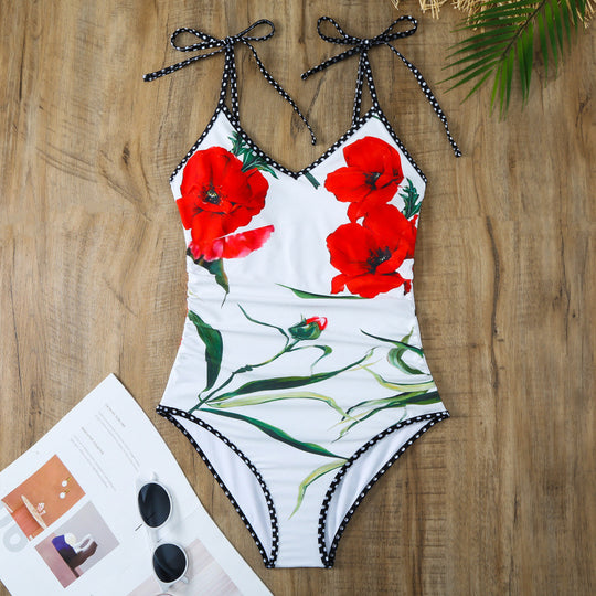 Damen Einteiler Badeanzug mit floralen Akzenten und passendem Wickelrock EB