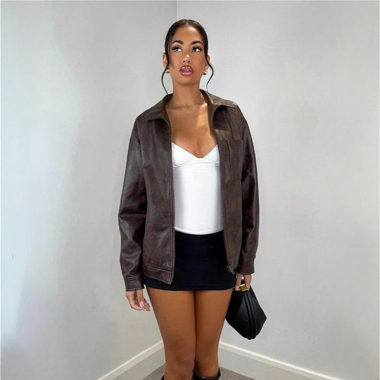 Damen Kunstlederjacke mit oversized Schnitt und praktischer Brusttasche EB