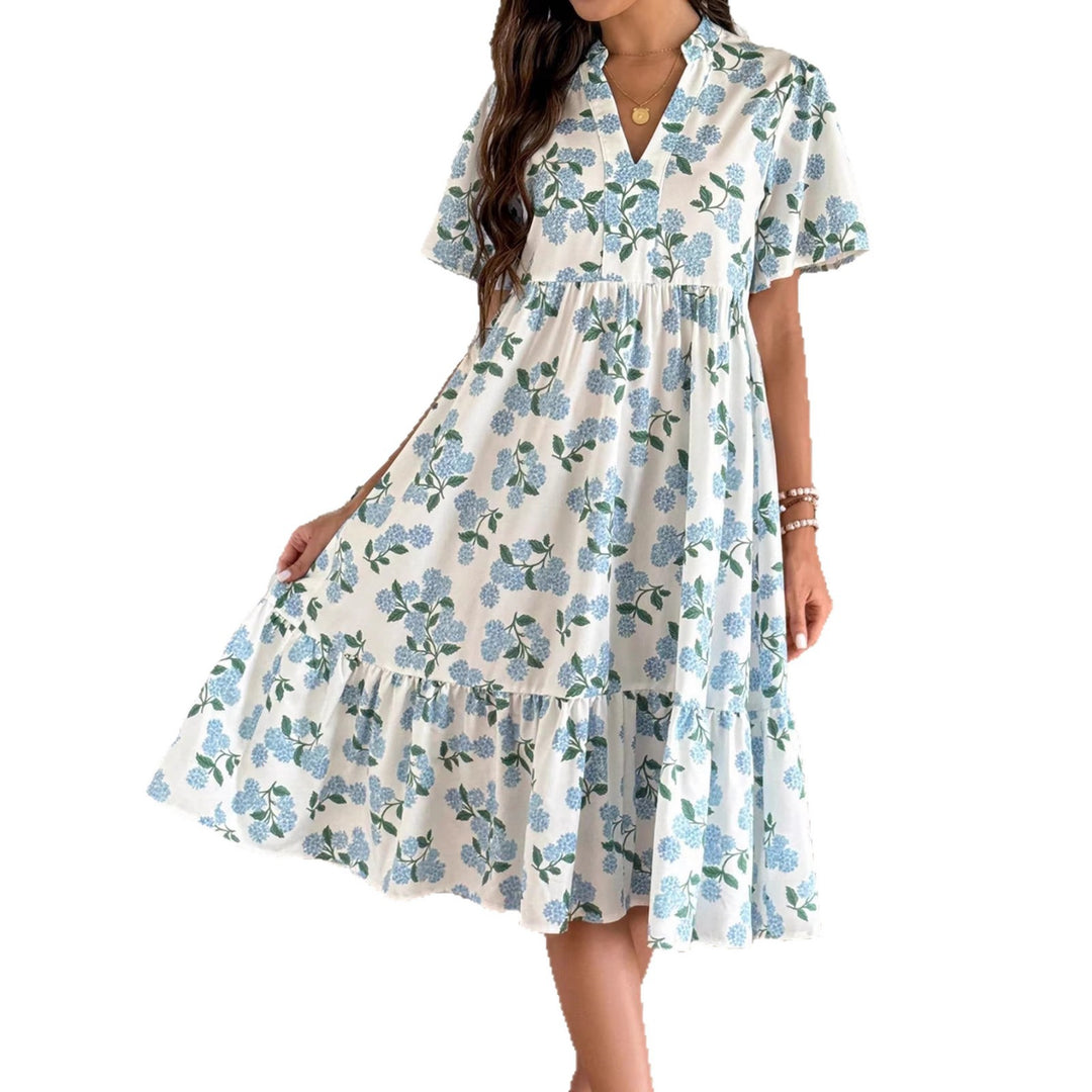 Damen Midikleid mit frischem Blumenmuster und voluminösem Rock EB