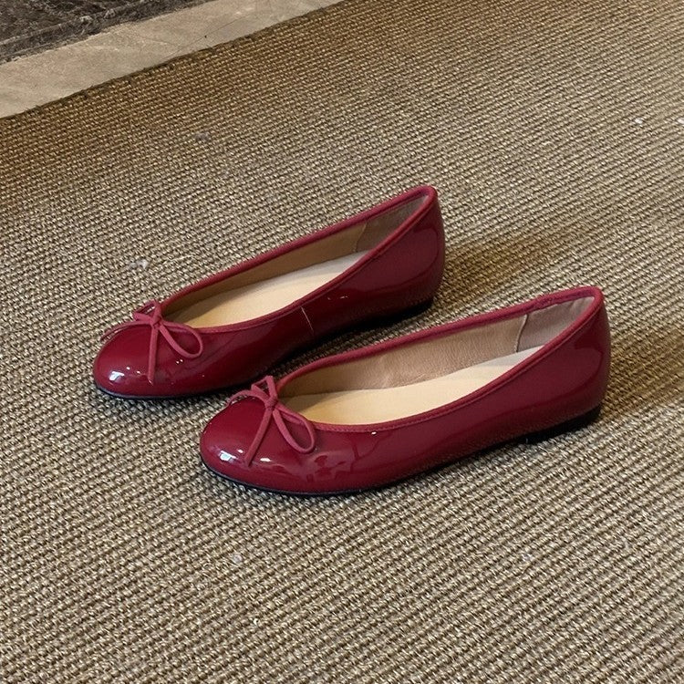 Damen Ballerina-Schuhe mit glänzender Oberfläche und verspieltem Schleifenakzent EB