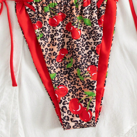 Damen Triangel-Bikini mit floralem Kirschmuster und verspielten Details EB