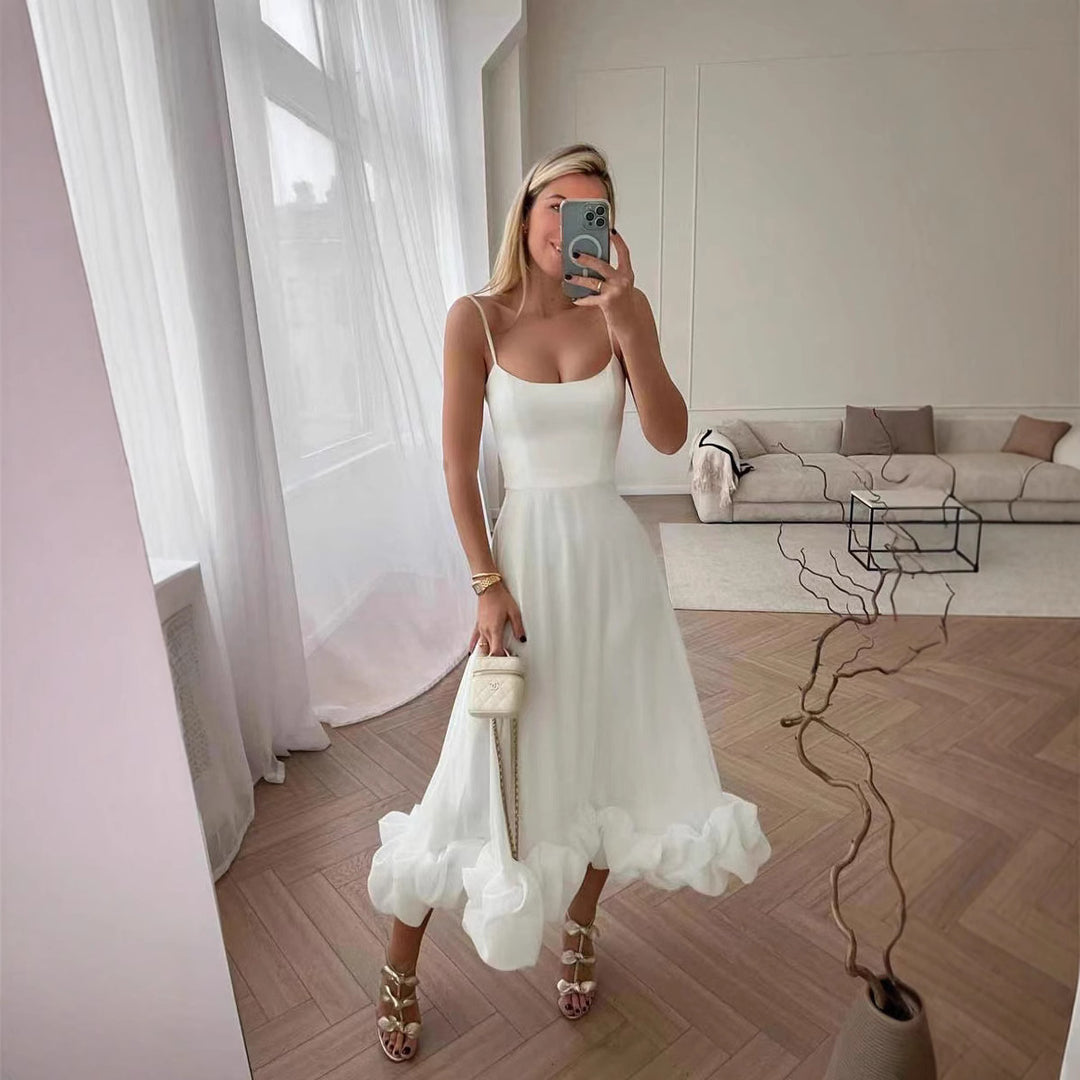 Damen Midi-Kleid mit zarten Spaghetti-Trägern und voluminösem Rüschensaum EB