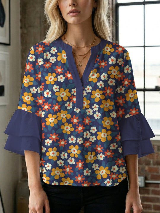 Damen Bluse mit voluminösen Flügelärmel und intensivem Blattmuster EB