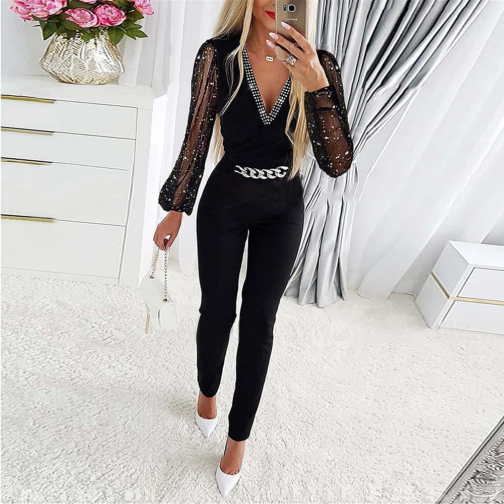 EB | Jumpsuit Slim Passform V-Ausschnitt mit Diamantdetails Schnittärmel Kettengürtel