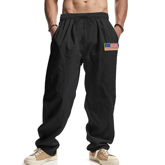 Herren Locker sitzende Freizeit-Hose im Leinen-Look mit elastischem Bund, Kordelzug & Flaggenpatch EB