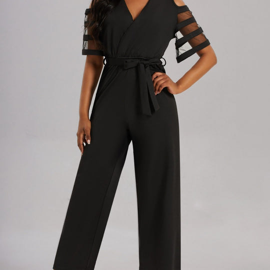 Damen Eleganter Jumpsuit mit transparenten Ärmel-Details und Taillengürtel EB