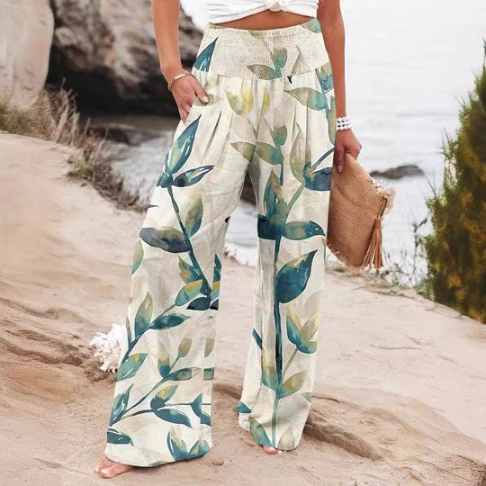 Damen Weit geschnittene Strandhose mit floralem Motiven und elastischem Bund EB