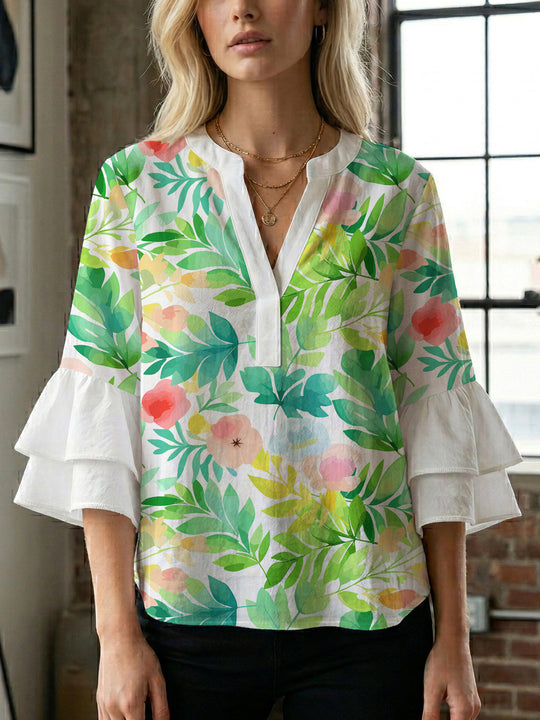 Damen Bluse mit voluminösen Ärmeln und floralem Design EB