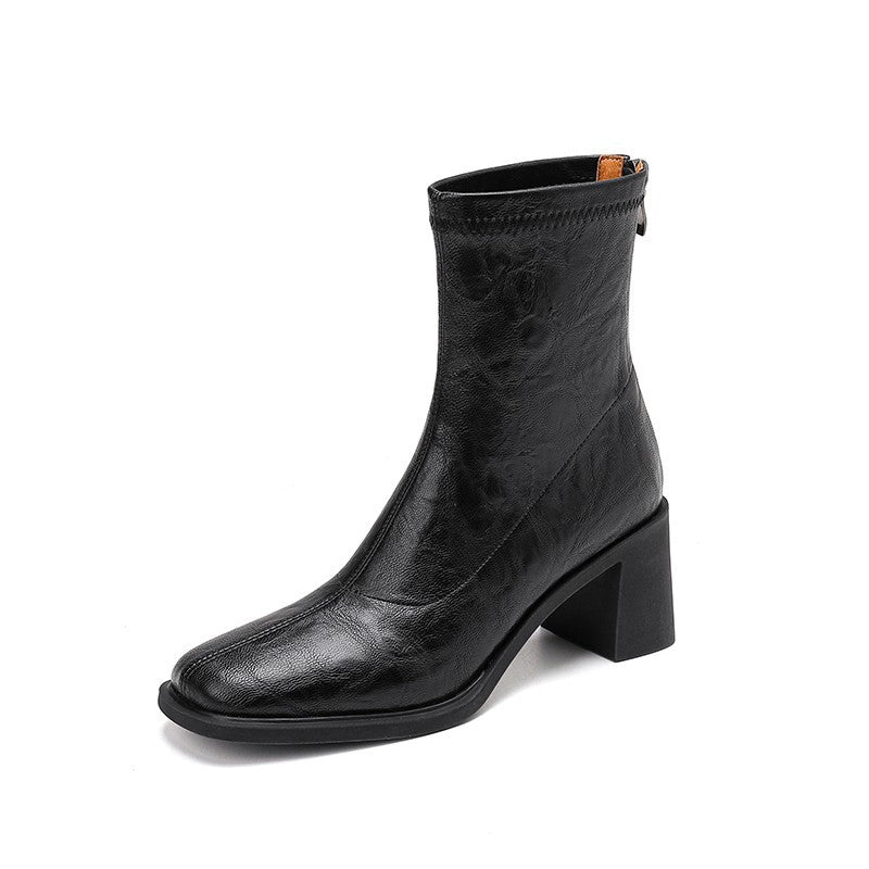 Damen Stiefeletten mit hohem Blockabsatz und eleganter Silhouette EB