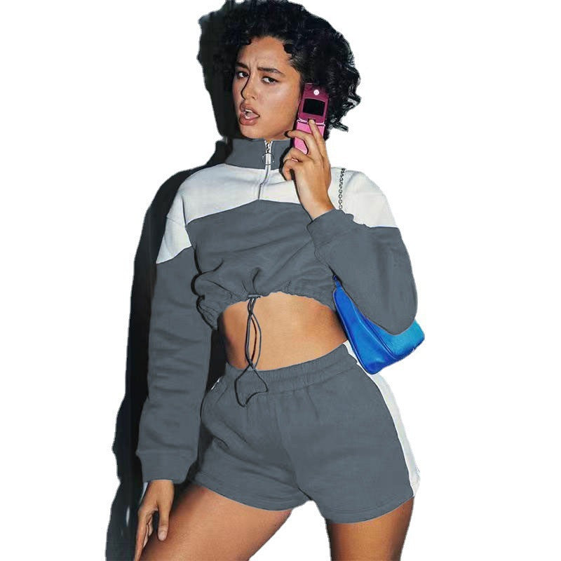 Damen modernes Sportoberteil mit kurzem Schnitt und dazu passender Shorts EB