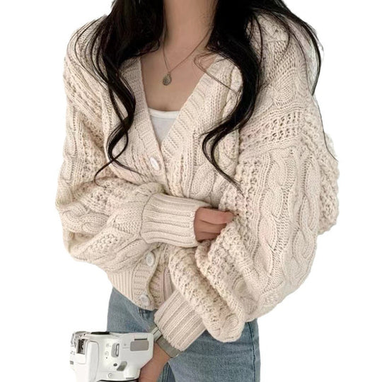 Damen Grobstrickjacke mit voluminösen Ärmeln und einzigartigem Zopfmuster EB