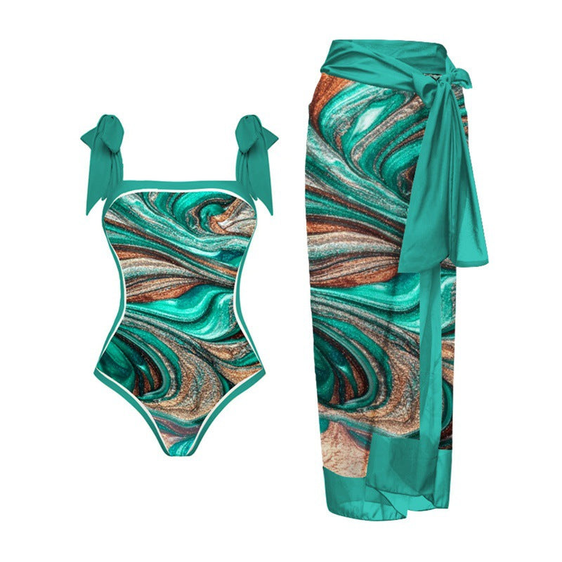 Damen Einteiler Badeanzug mit elegantem Wickelrock und modischen Riemen EB