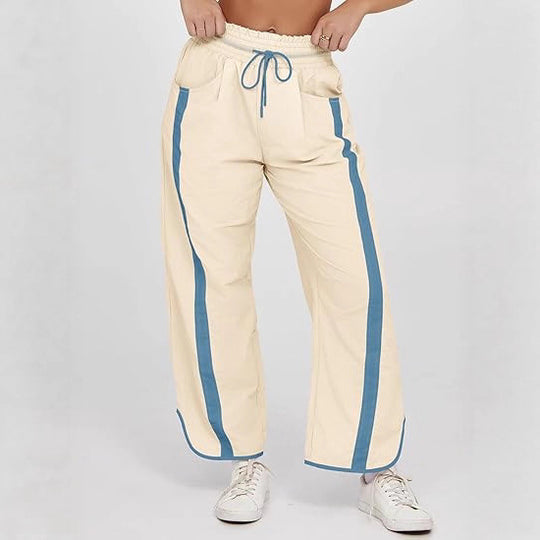 Damen nan relaxte Trackpants mit seitlichem Kontraststreifen, elastischem Smokbund und Eingrifftaschen EB